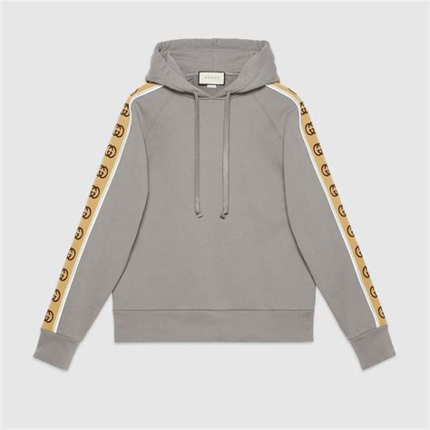 Sudadera con capucha de punto de algodón en gris .